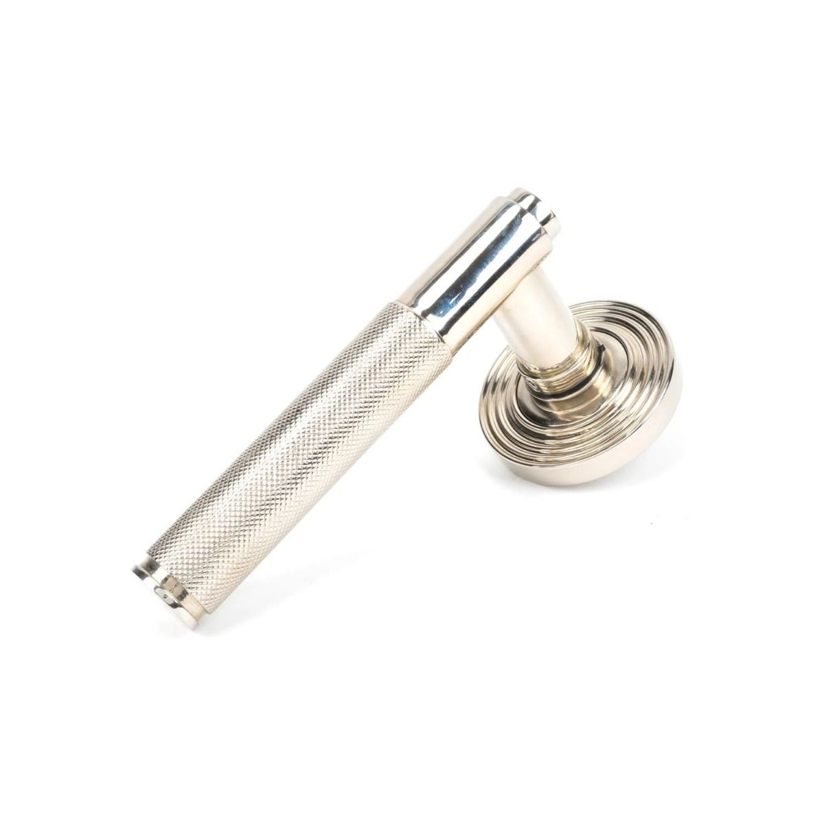 The Polished Nickel Knurled Lever on Beehive Rose Set on a White Background 