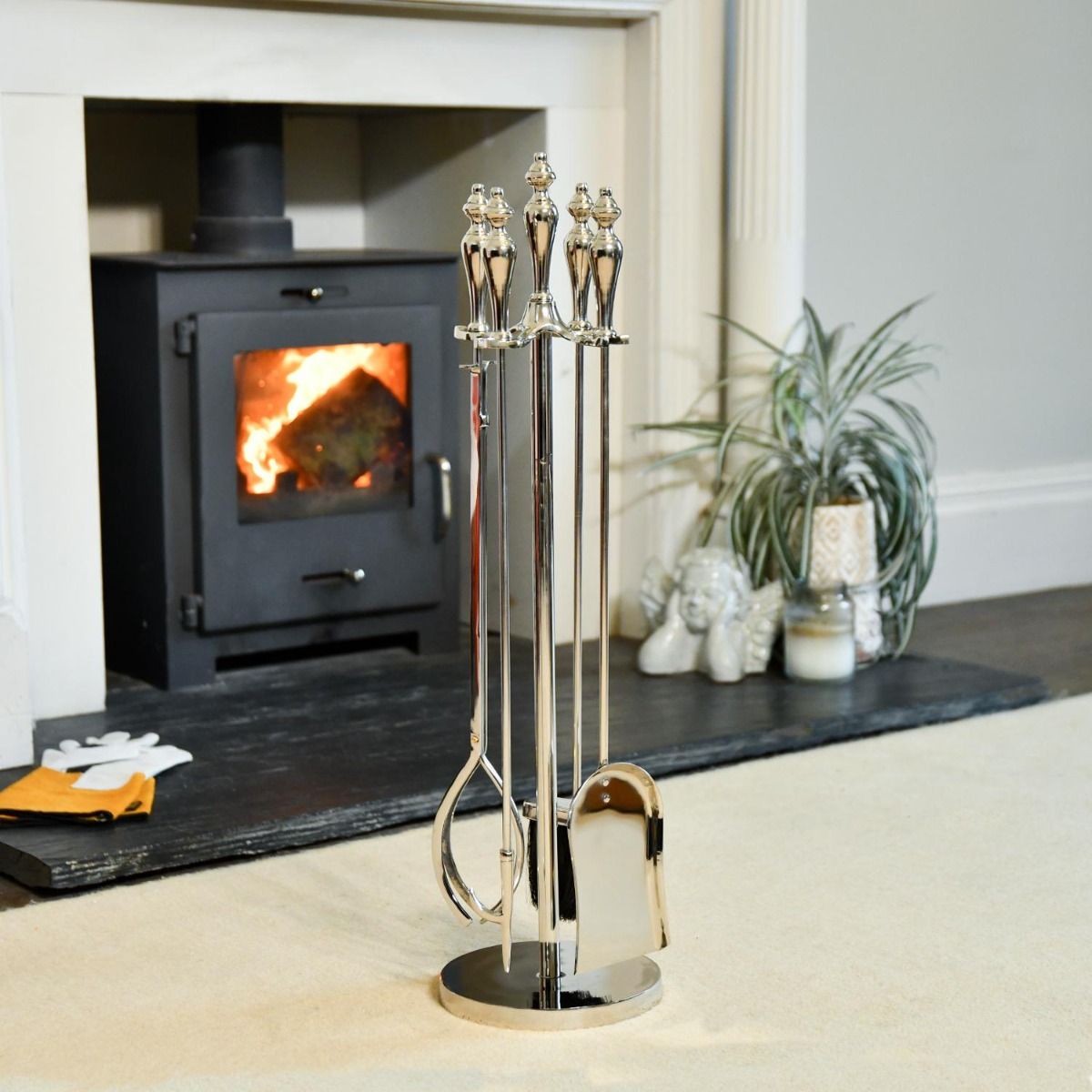 The Polished Steel Urn Style Companion Set in Front of a Modern Fireplace  - Digital Illustration