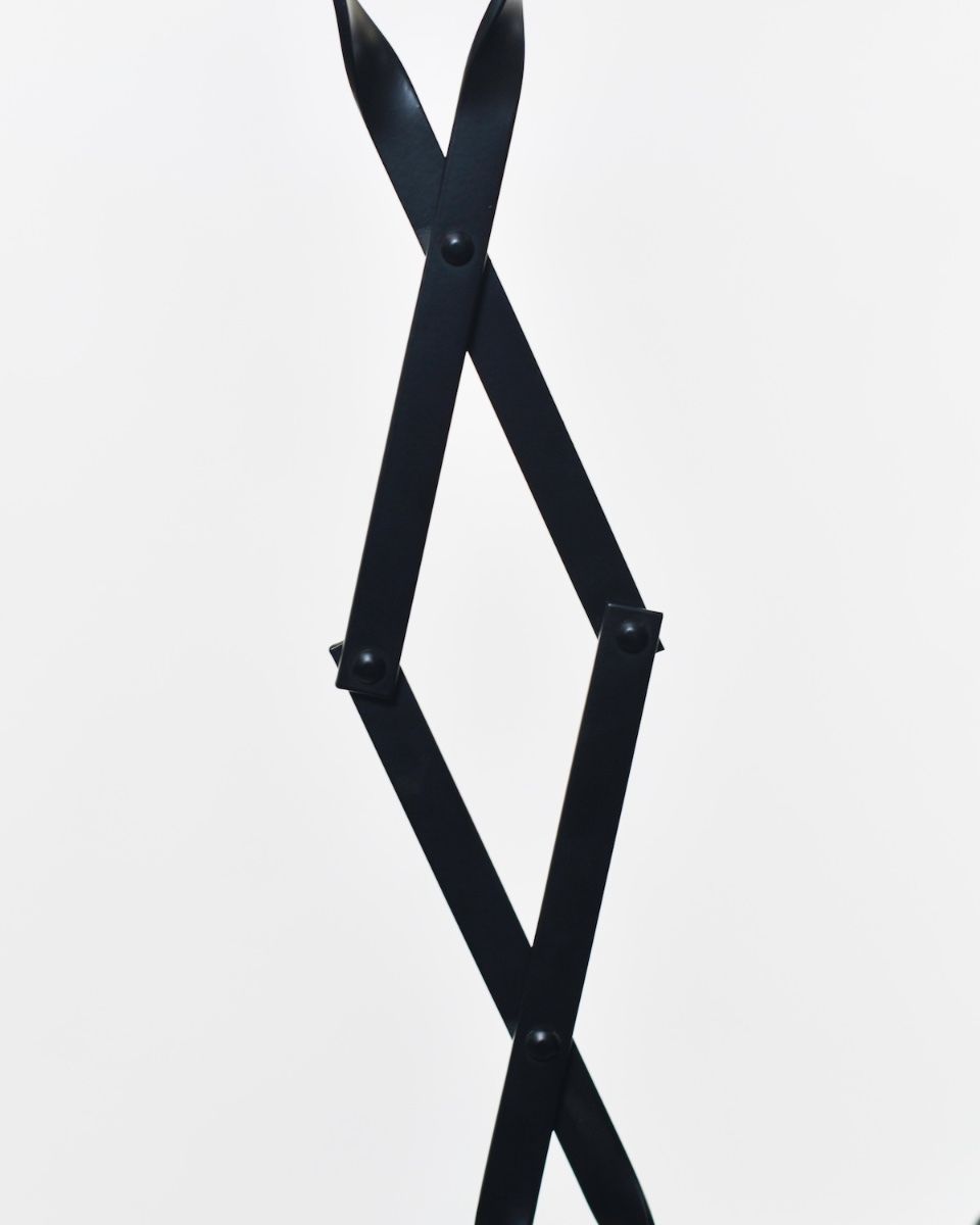 The “Prism” Steel Fire Place Tongs folding mechanism