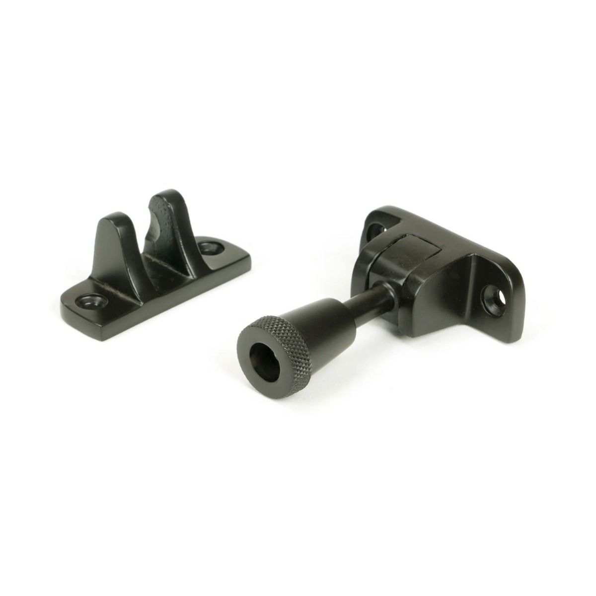 The Radiused Knurled Brighton Sash Window Fastener in Aged Bronze on a White Background 