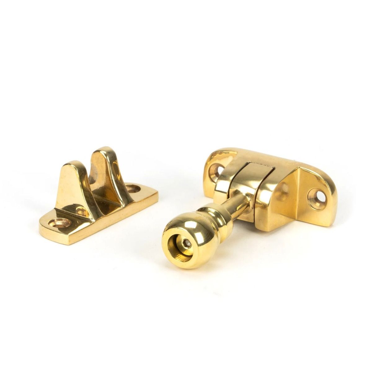 The Radiused Rounded Brighton Sash Window Fastener in Polished Brass on a White Background 