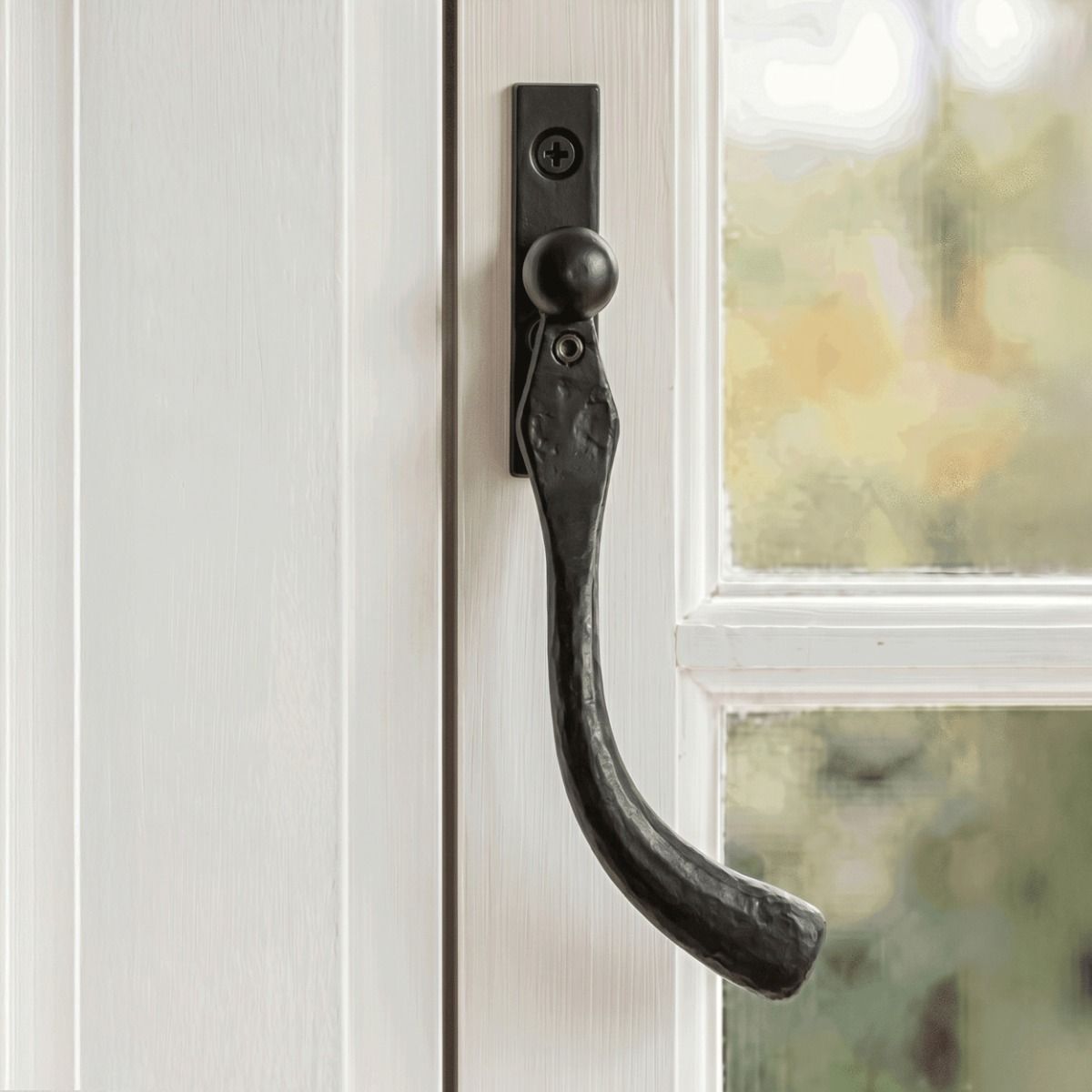 The Right Handed 16mm Beeswax Peardrop Espagnolette Window Handle on a Traditional White Wooden Window Frame - Digital Illustration 