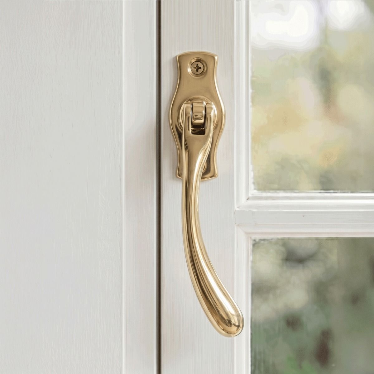 The Right Handed Polished Brass Peardrop Window Handle Screwed onto a Classic White Window Frame in a Contemporary Home - Digital Illustration 