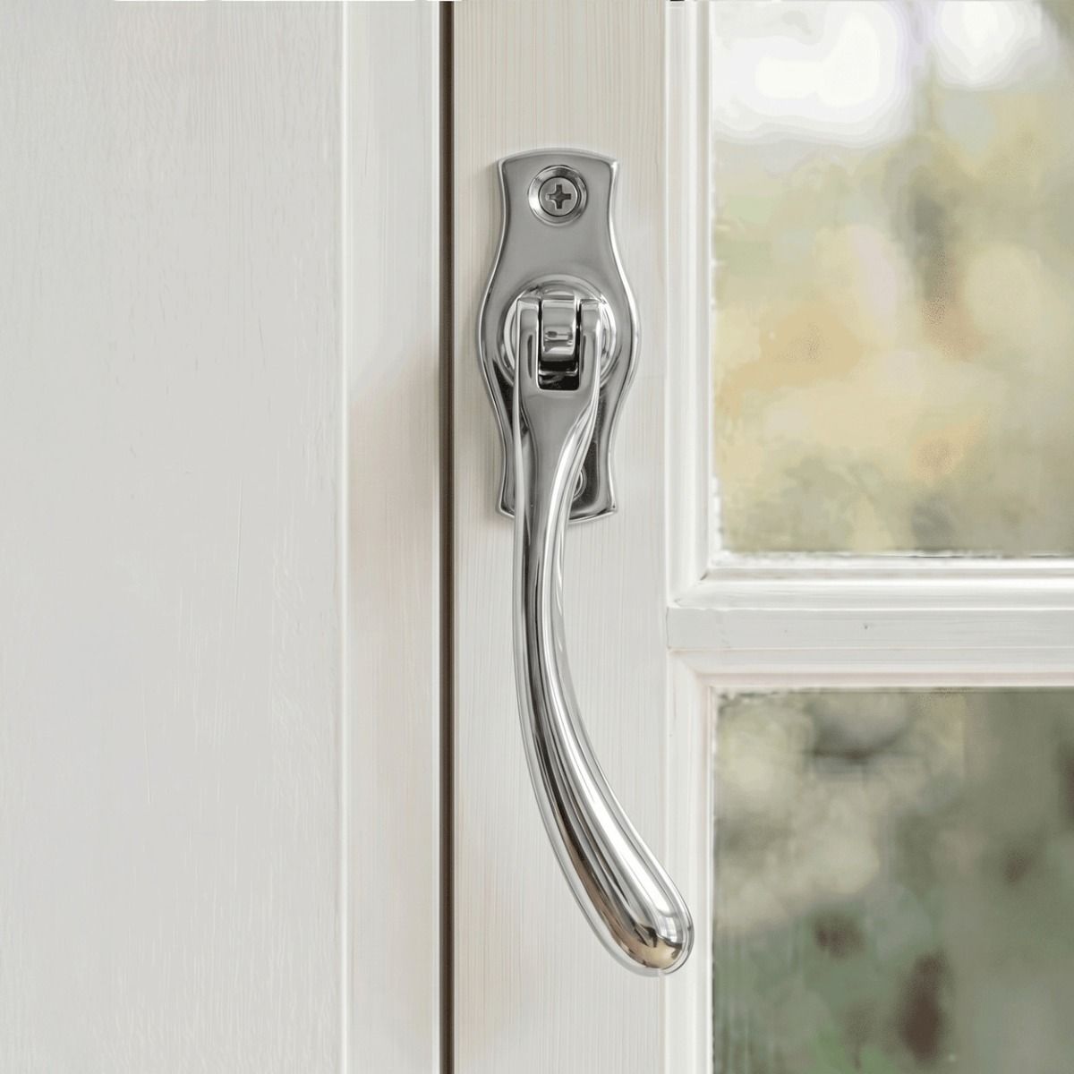 The Right Handed Polished Chrome Peardrop Window Handle Fitted on a White Window Frame in a Country Home - Digital Illustration 