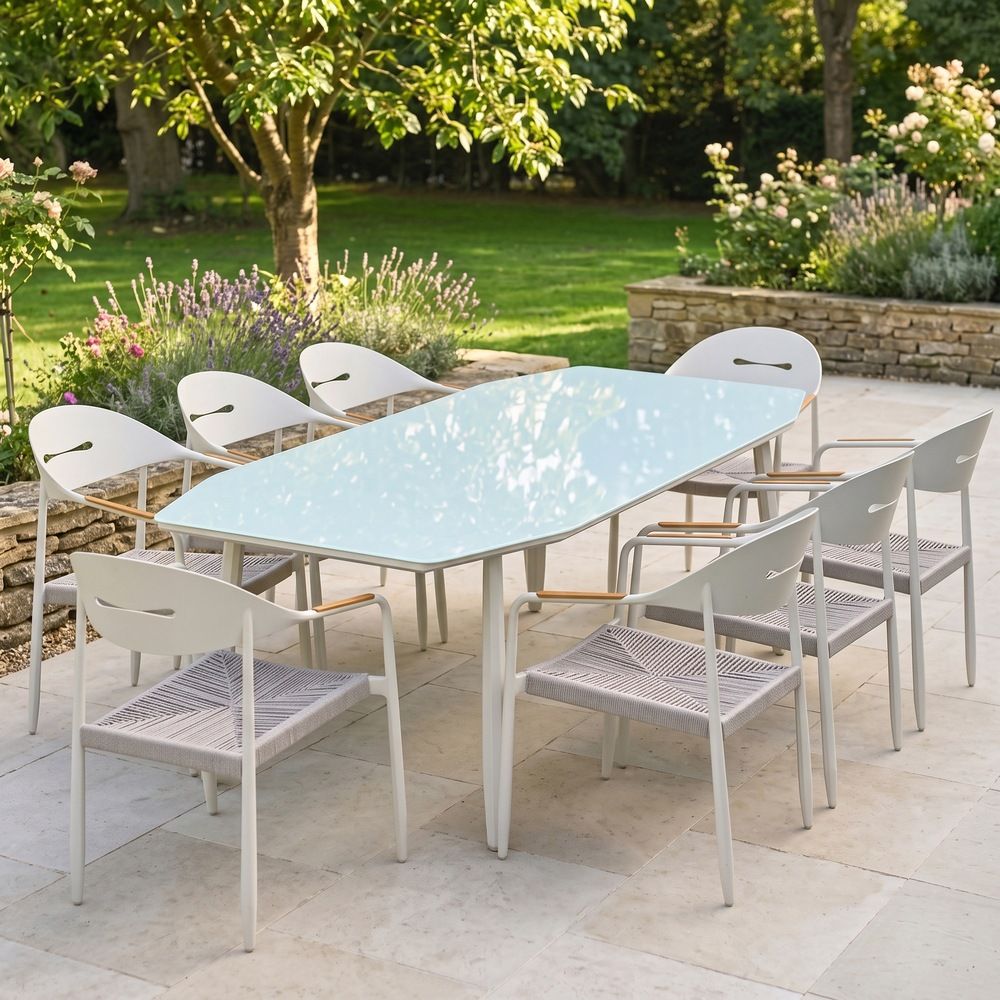 The Riviera 8-Seater Outdoor Dining Set Shown in Golden Sunlight on a Garden Patio - Digital Illustration