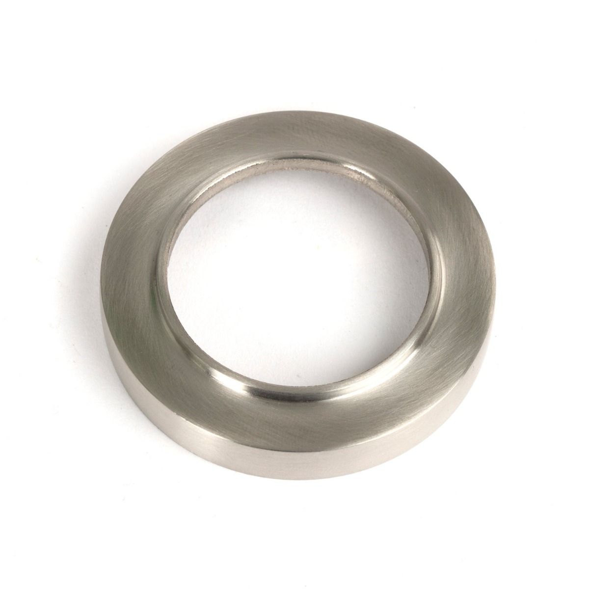 The Round Concealed Standard Keyhole Escutcheon in Satin Stainless Steel Showing Just the Backplate on a White Background