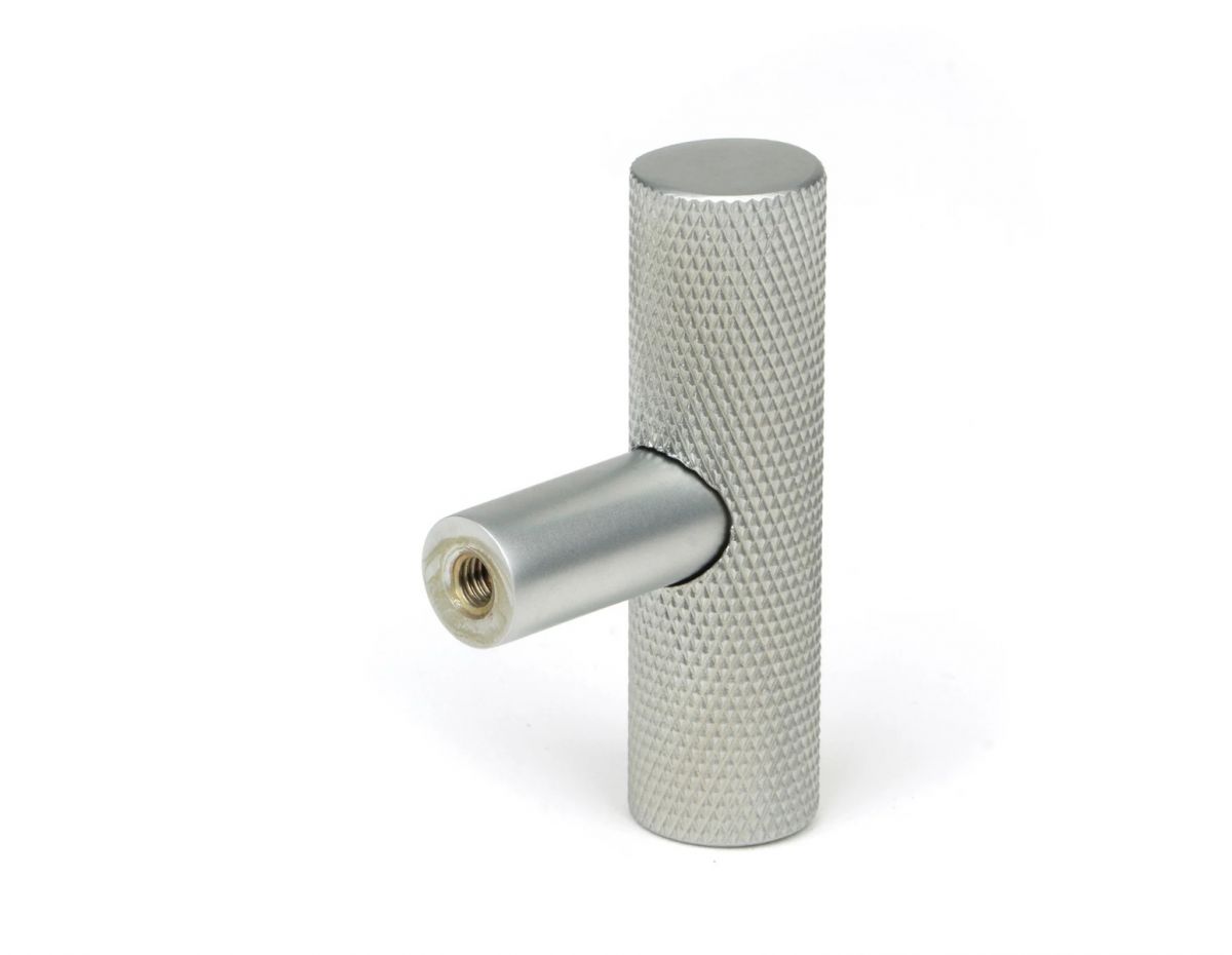 The Satin Chrome "Astor" Knurled Industrial T-Bar Cabinet Fitting Displayed on a White Background Shown from Behind
