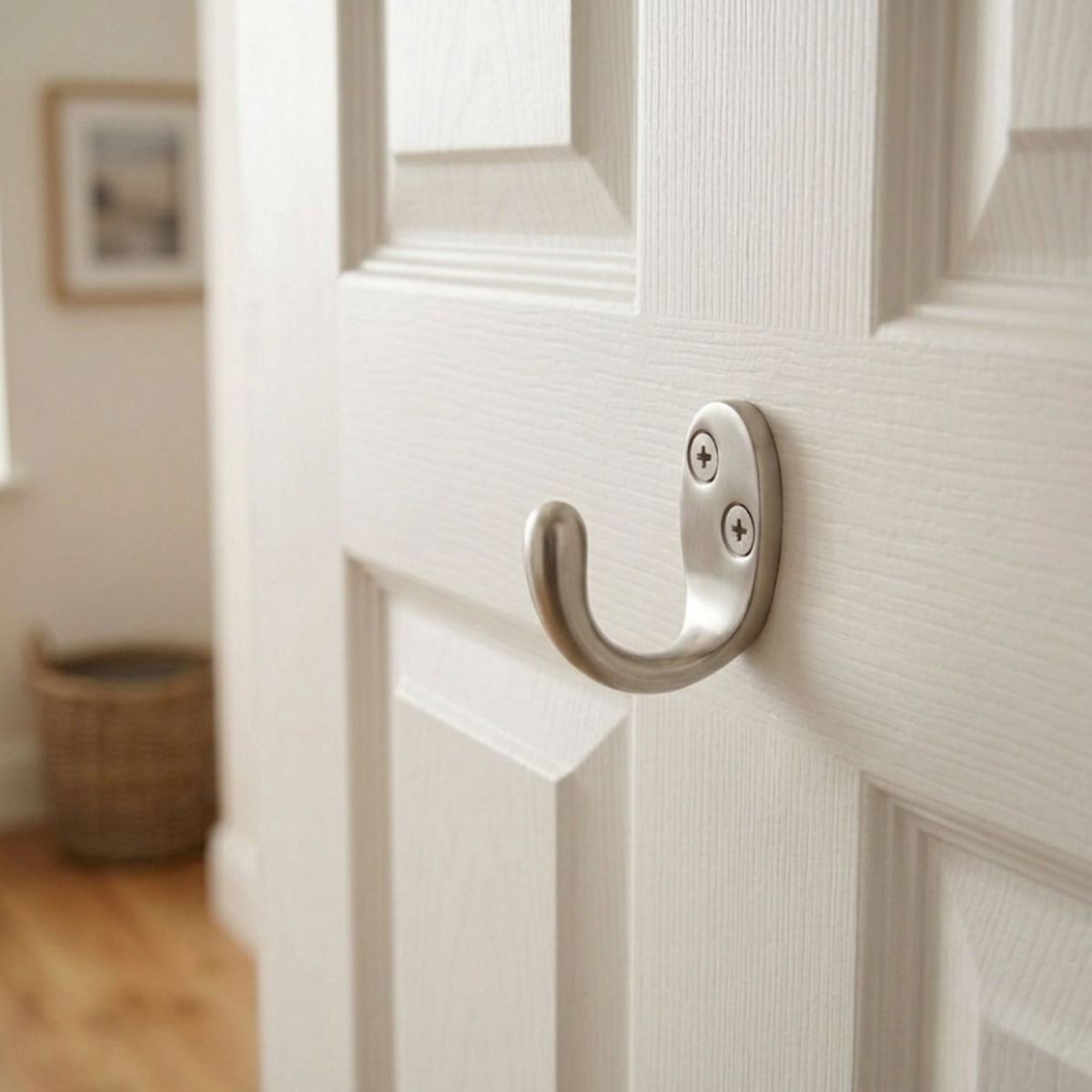 The Satin Chrome Single Pronged Coat Hook on a White Bedroom Door in a Modern Home - Digital Illustration