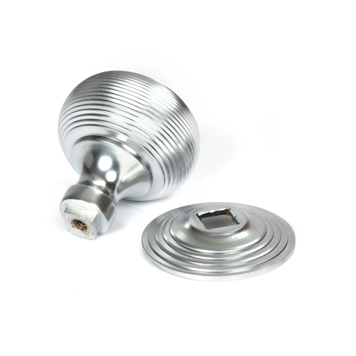 The Satin Chrome Traditional Beehive Centre Door Knob on a White Background shown from Behind with Rose