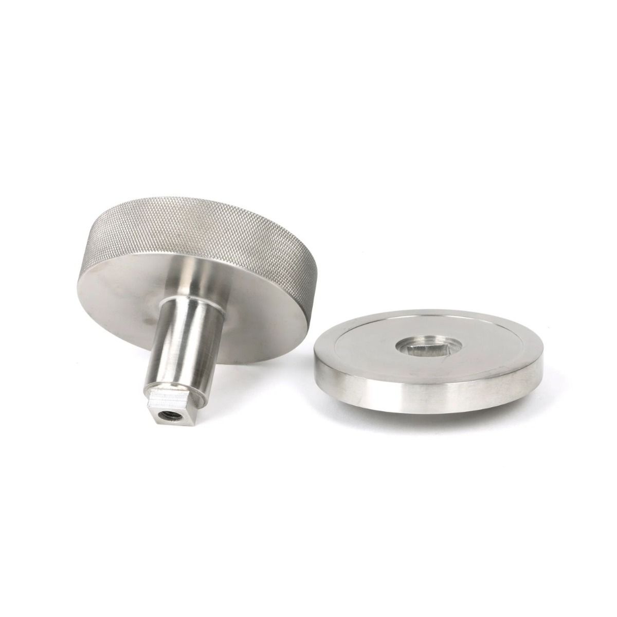 The Satin Stainless Steel Knurled Centre Door Knob on a Plain Rose on a White Background Displayed in Separate Sections 