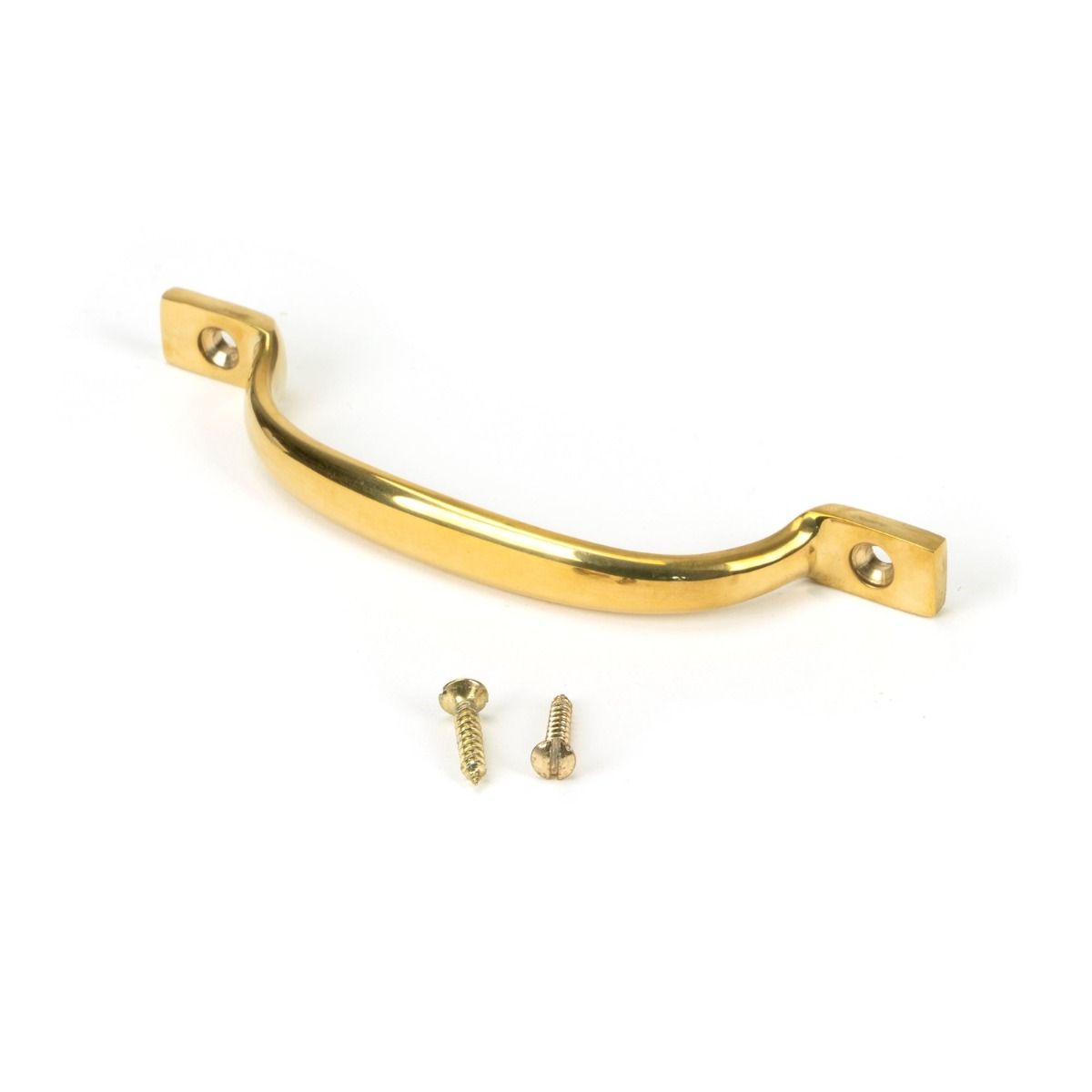 The Slim Sash Window Lift Pull Handle in Polished Brass Shown Resting on its Side with Supplied Screws