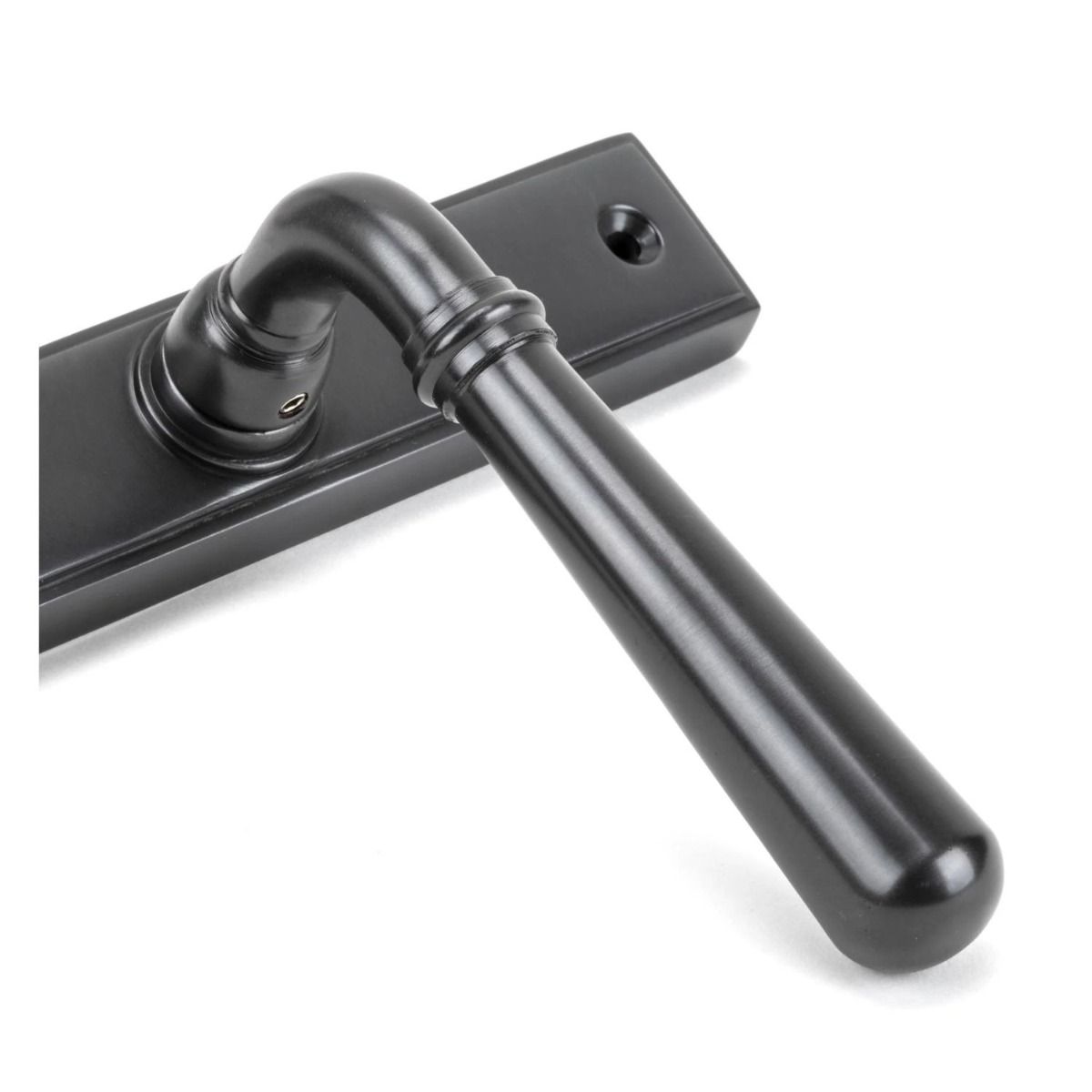 The Slimline Lever Espagnolette Door Latch in Aged Bronze Close up of the Handle