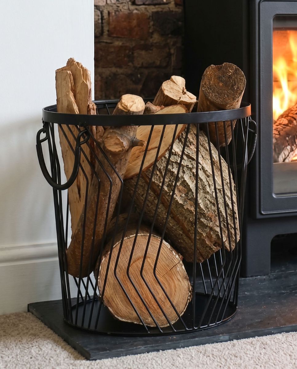 The Small Art Deco Wire Log Basket in Front of a Traditional Log Burner Stove - Digital Illustration