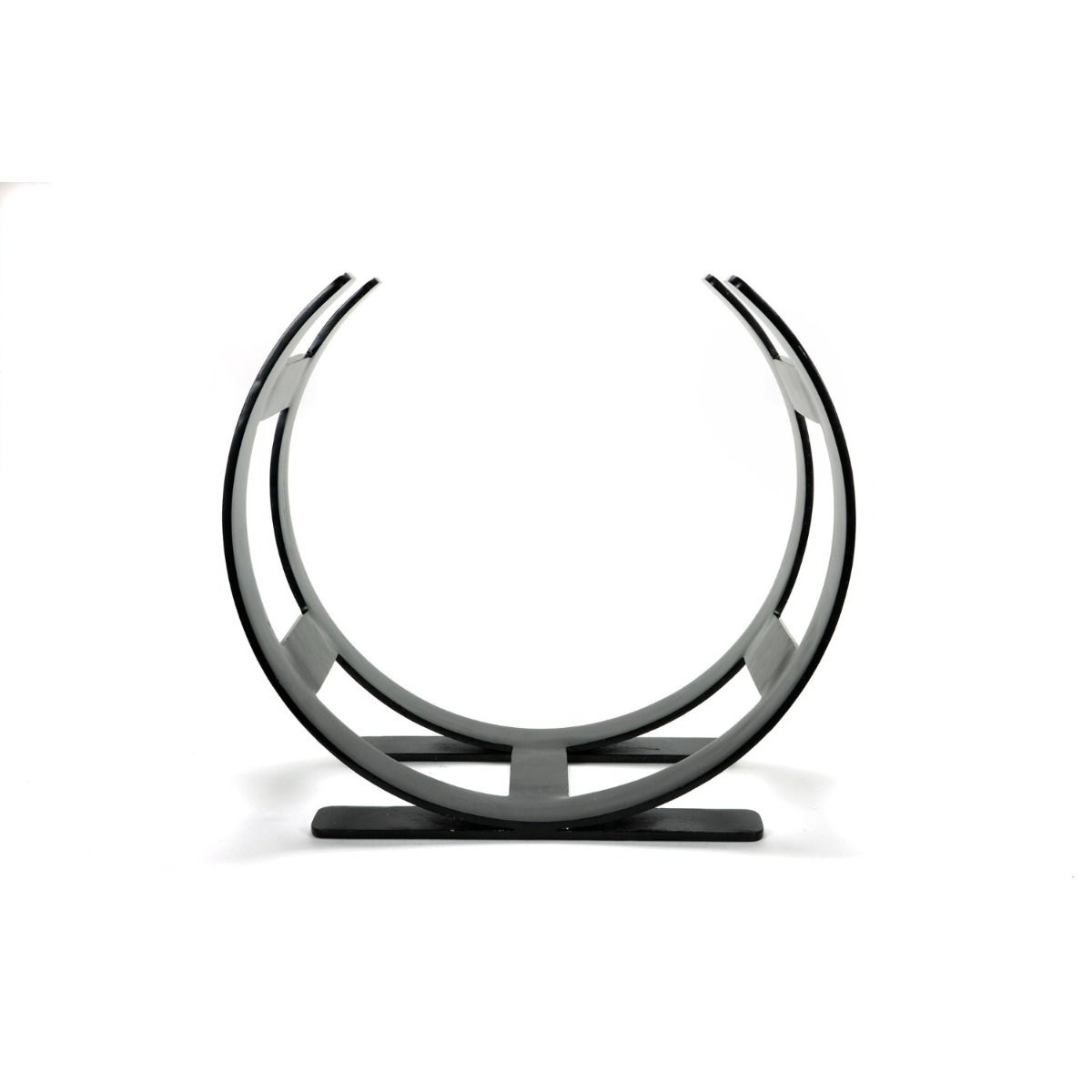 The Small Curved Fireside Log Holder in Matt Black Shown from the Side on a White Background