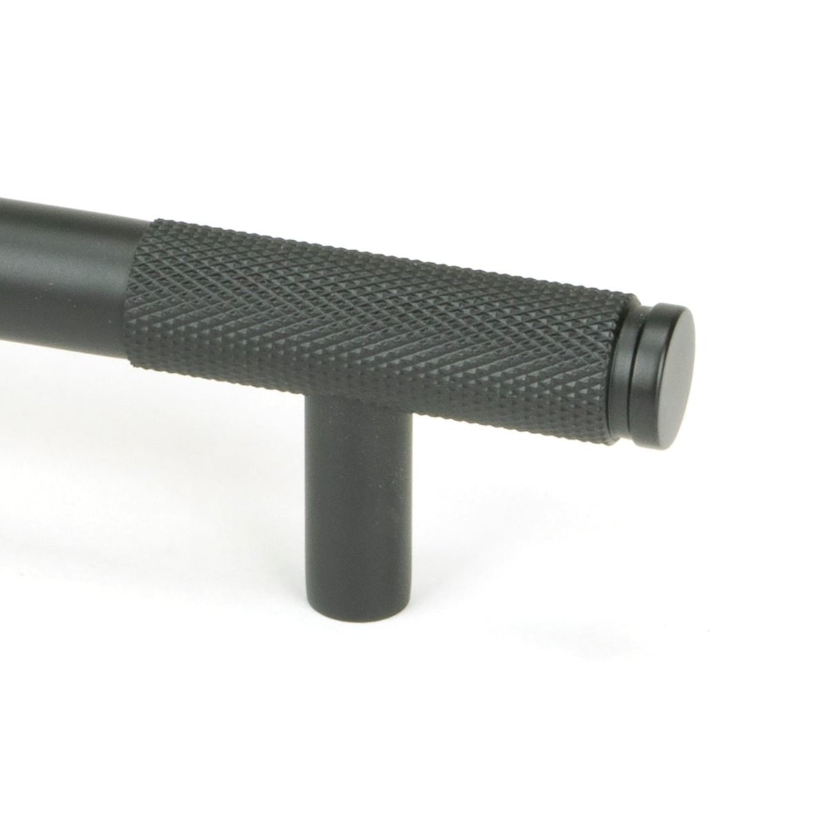 The Small Half Knurled Cabinet Pull Handle in Matt Black Looking Close up of the End of the Knurled Handle
