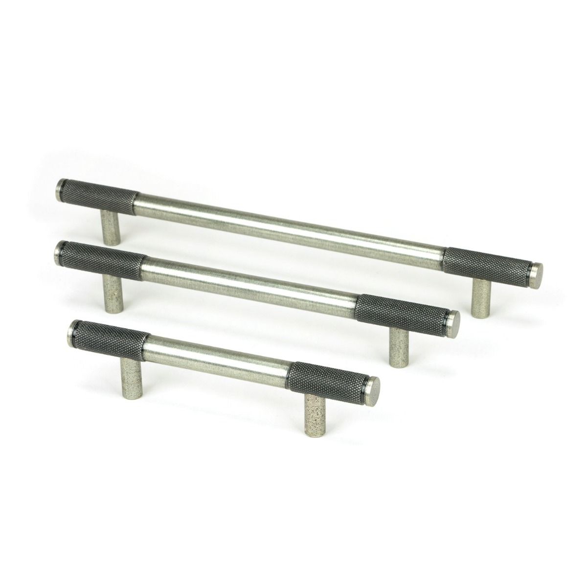 The Small Half Knurled Cabinet Pull Handle in Pewter Shown Alongside Other Sizes on a White Background