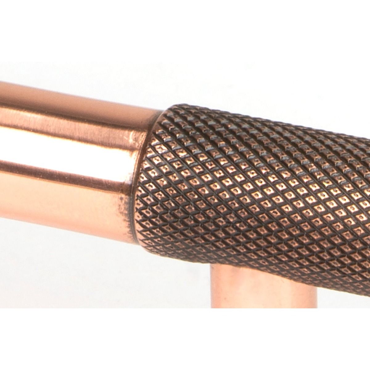 The Small Half Knurled Cabinet Pull Handle in Polished Bronze Looking Close up of the Smooth Grip on the Central Bar