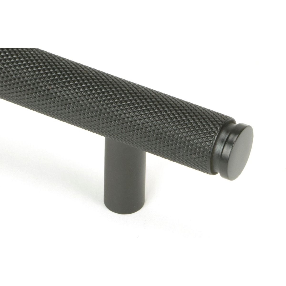 The Small Knurled Cabinet Pull Handle in Aged Bronze Looking Close up of the End of the Knurled Handle