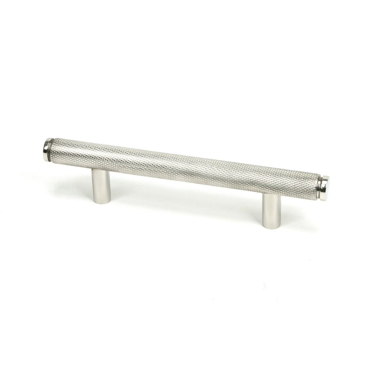 The Small Knurled Cabinet Pull Handle in Polished Stainless Steel Shown Upright on a White Background