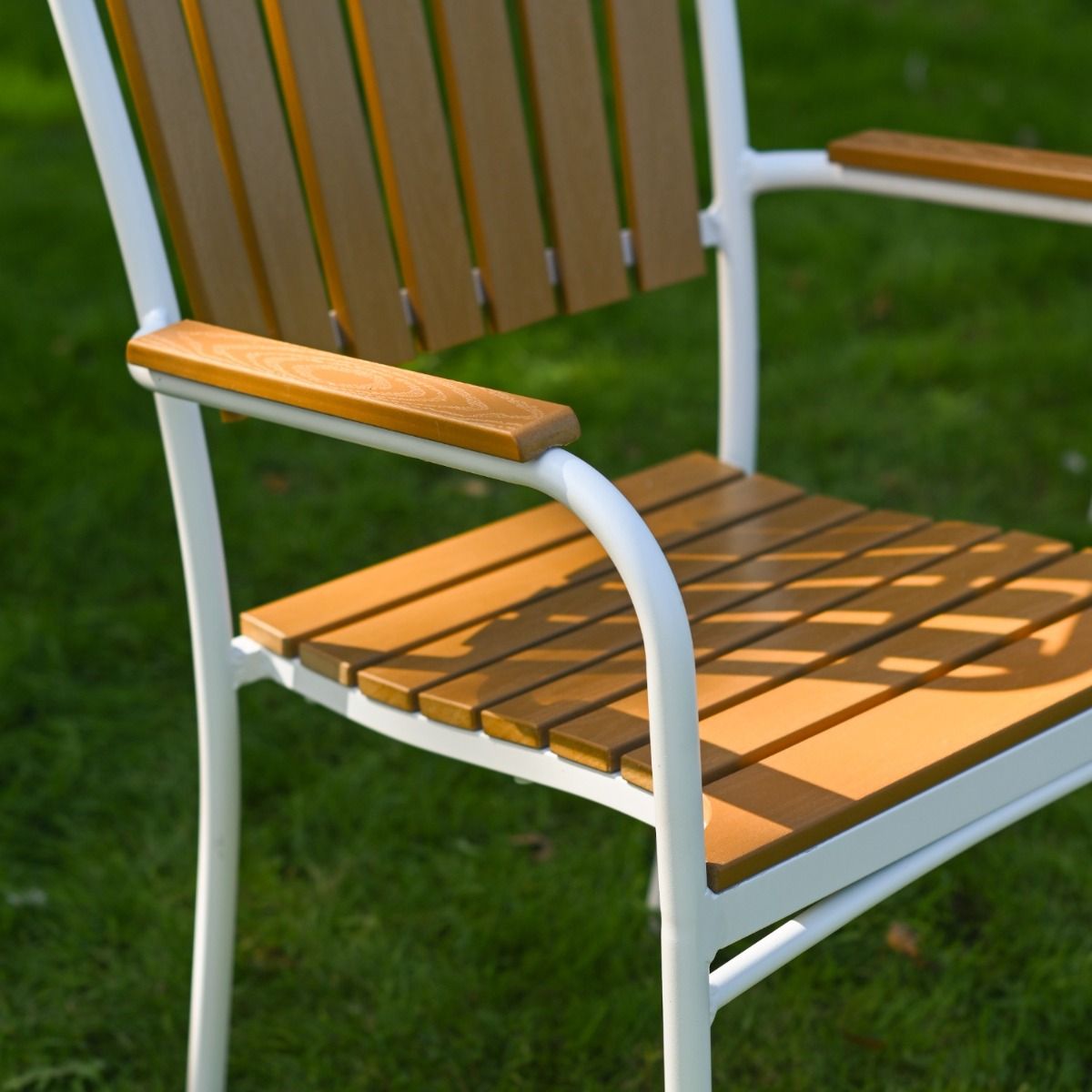 The Solis Round 4-Seater Outdoor Dining Set in White Showing a Close up of the Slatted Table Top