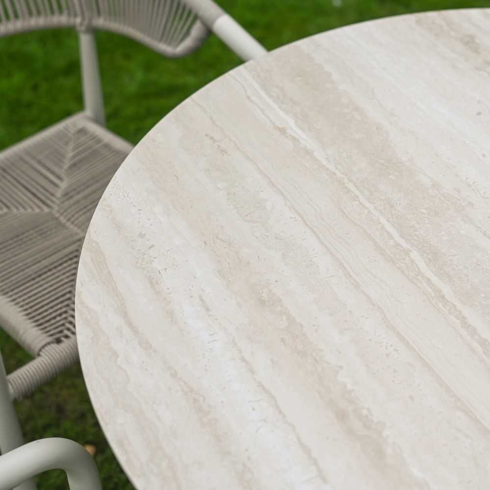 The Soria Woven 4-Seater Dining Set with a Close up of the Marble Effect Table Top