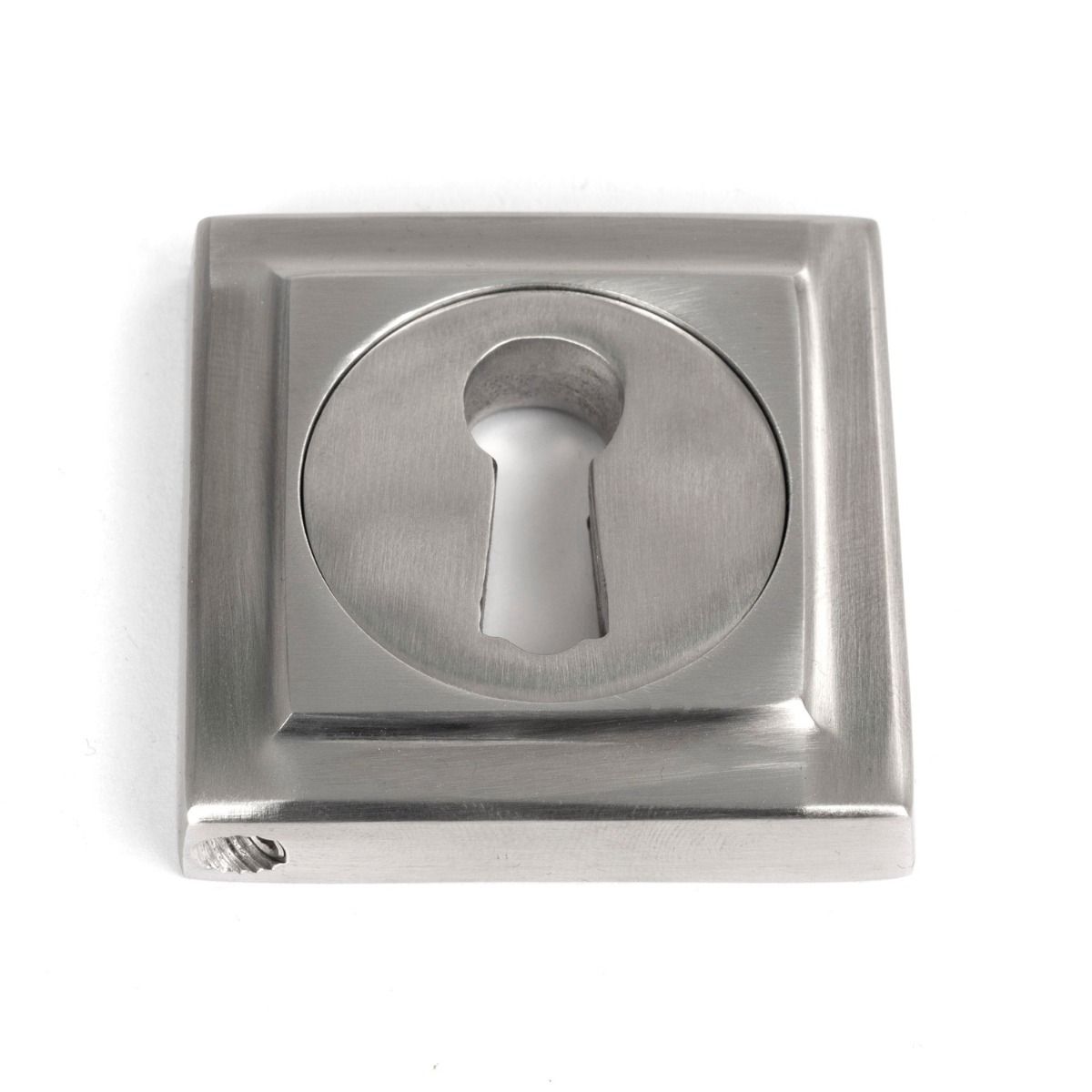 The Square Concealed Standard Keyhole Escutcheon in Satin Stainless Steel Shown on a White Background