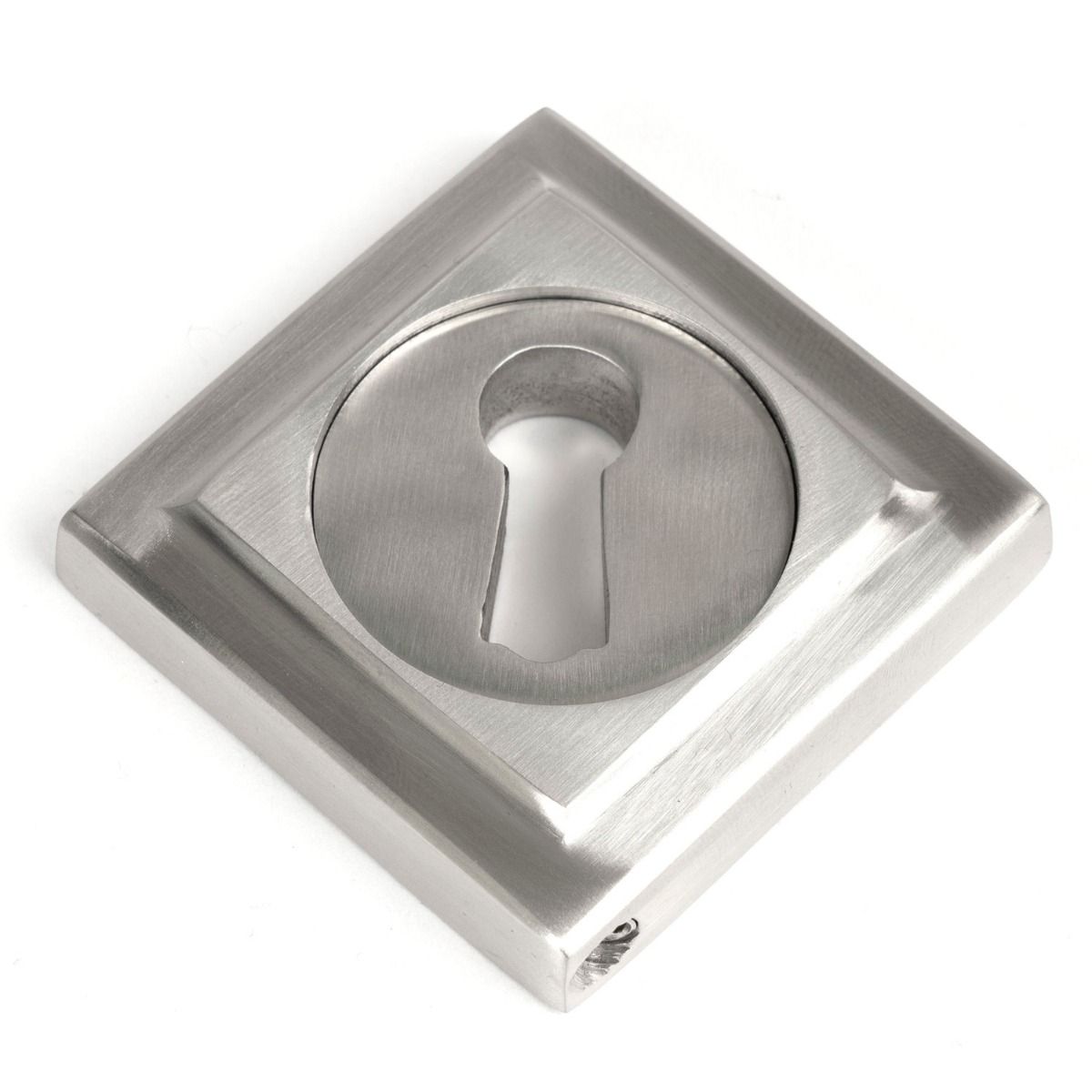The Square Concealed Standard Keyhole Escutcheon in Satin Stainless Steel Showing Just the Backplate on a White Background