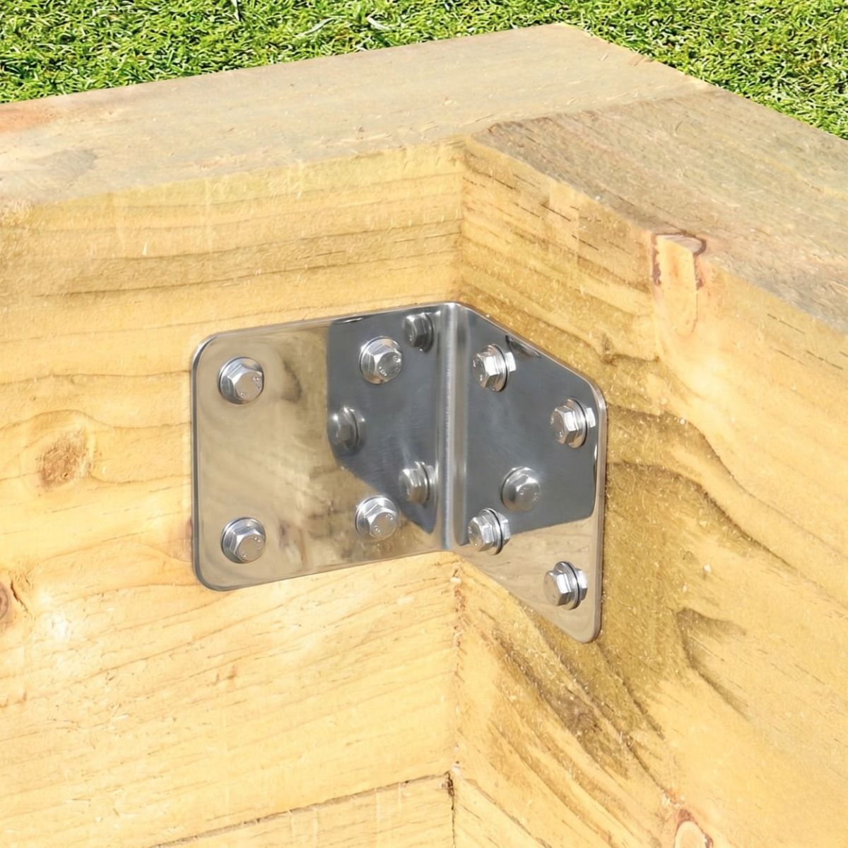 The Stainless Steel Railway Sleeper Internal Corner Support Bracket Fixed on a White Background a Wooden Raised Planter