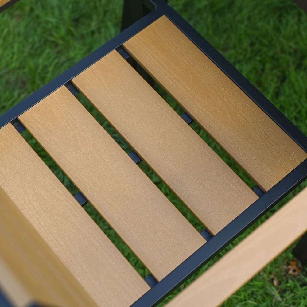 The Strata Slatted 4-Seater Outdoor Dining Set in Black Showing a Close up of the Slatted Seat