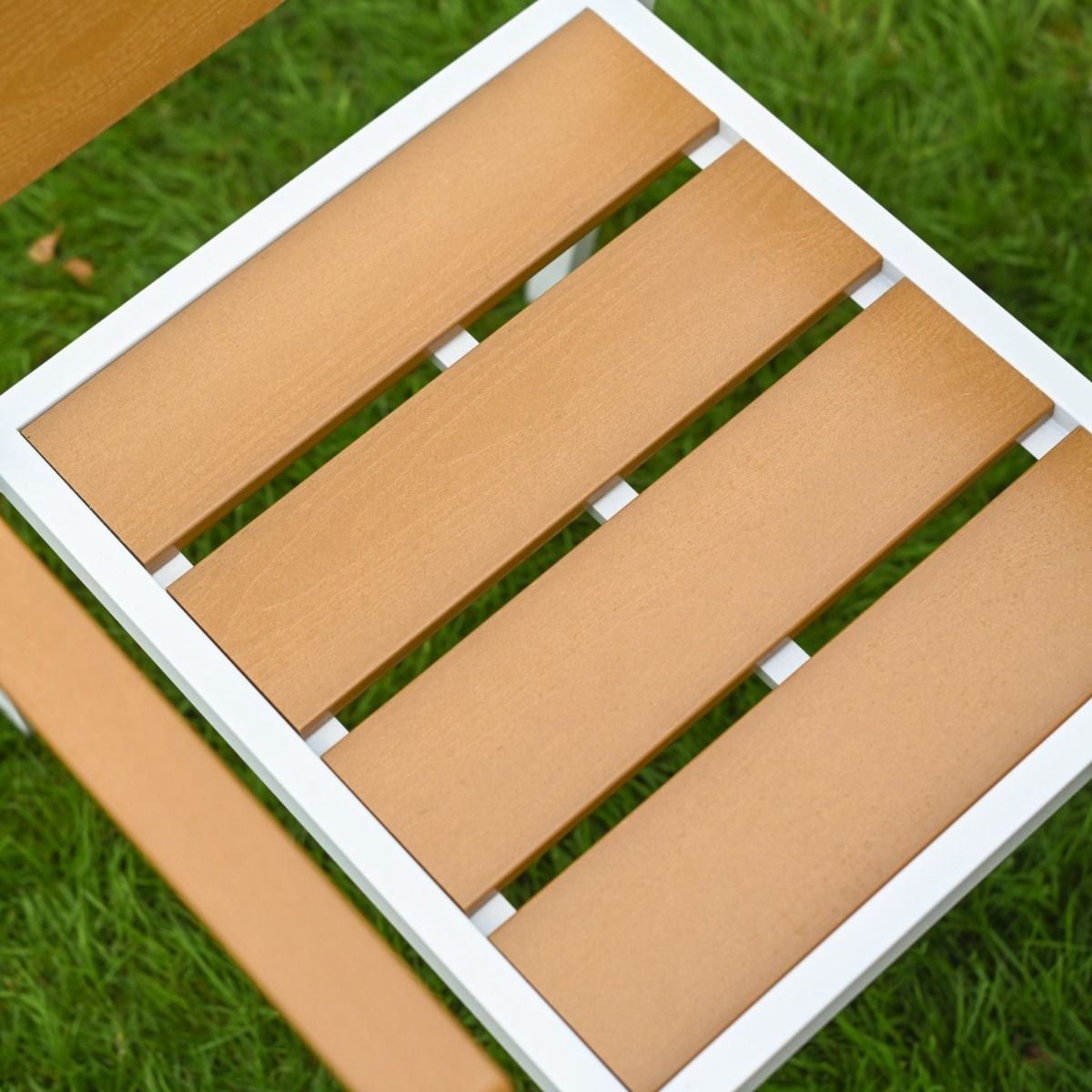 The Strata Slatted 4-Seater Outdoor Dining Set Showing a Close up of the Slatted Seat