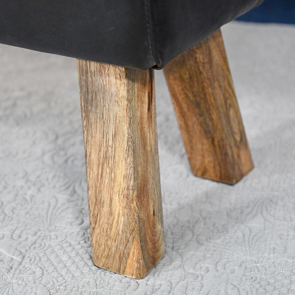 Close-up of the Mango Wood Legs on the Stool