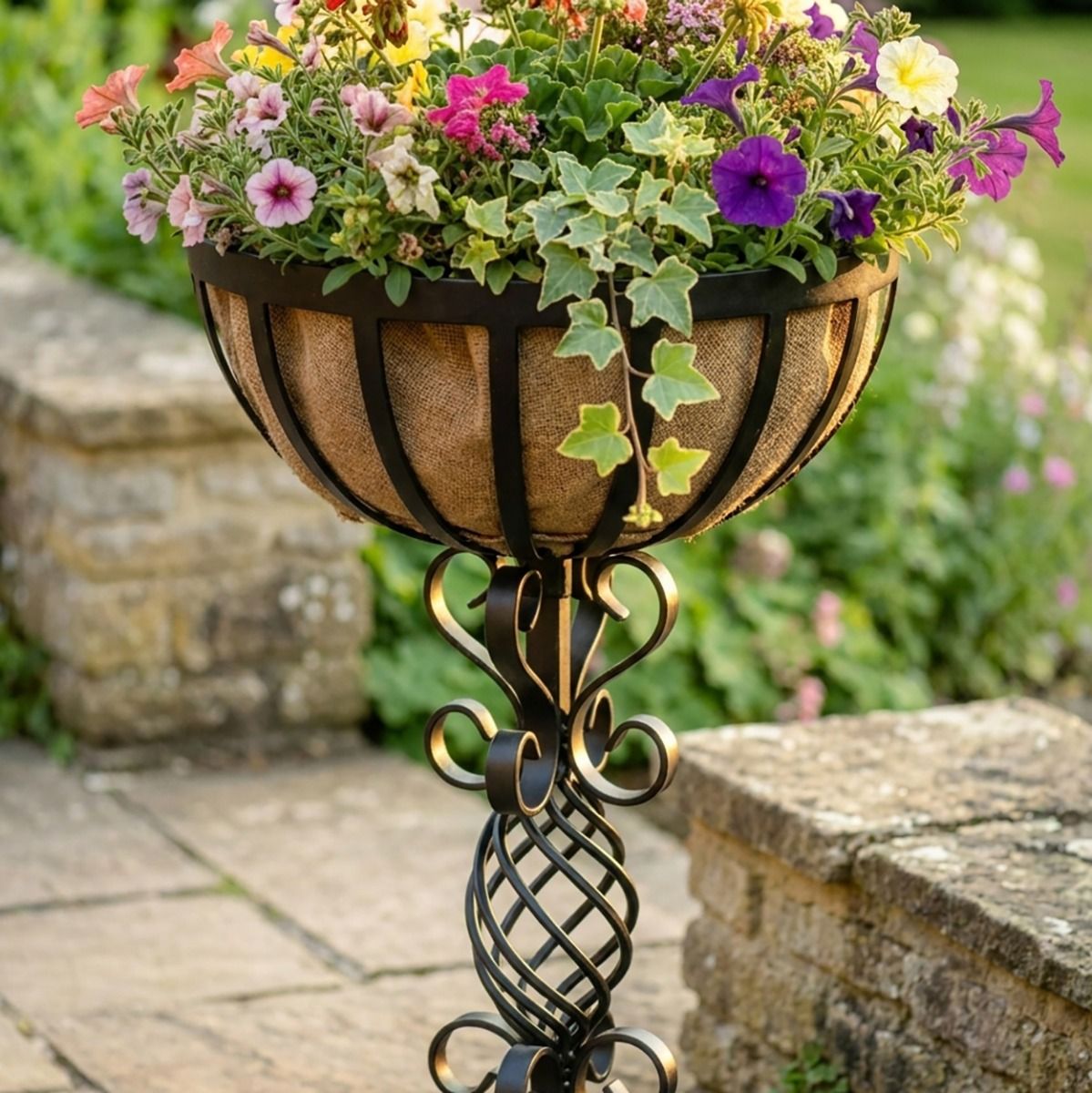 The "Stretton" Victorian Wrought Iron Basket Planter Stand in a Black Finish Showing a Close up of the Detailed and Decorative Spiral Scrollwork of the Top Half of the Planter - Digital Illustration 