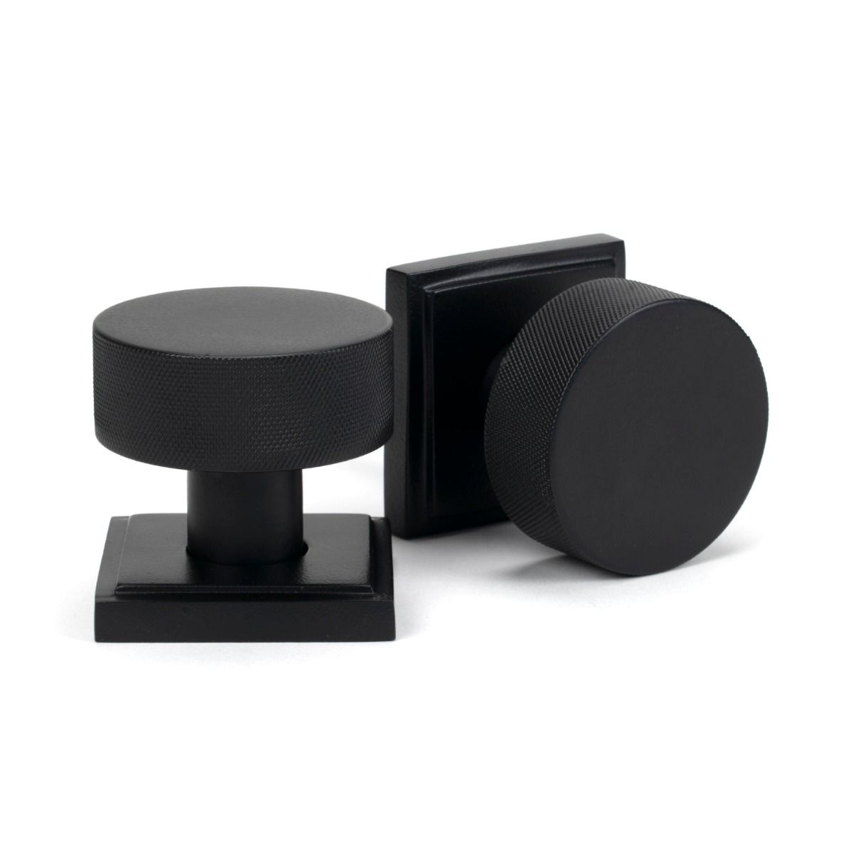 The Knurled Mortice/Rim Knob Set on a Square Rose in Matt Black Shown Upright on a White Background 