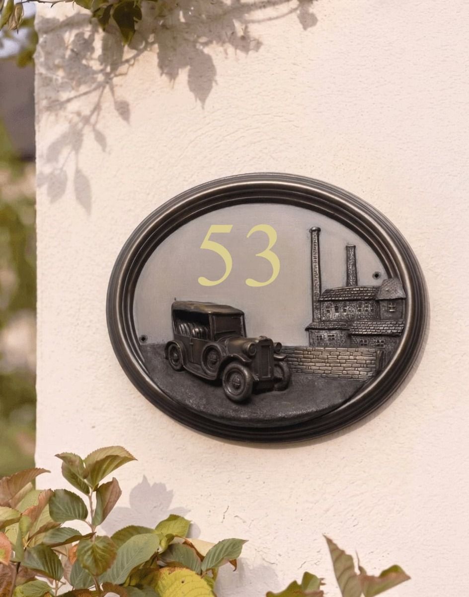 The Tin Lizzy Vintage Car House Sign Placed on a White Coloured Exterior Wall in a Sunny Garden - Digital Illustration 
