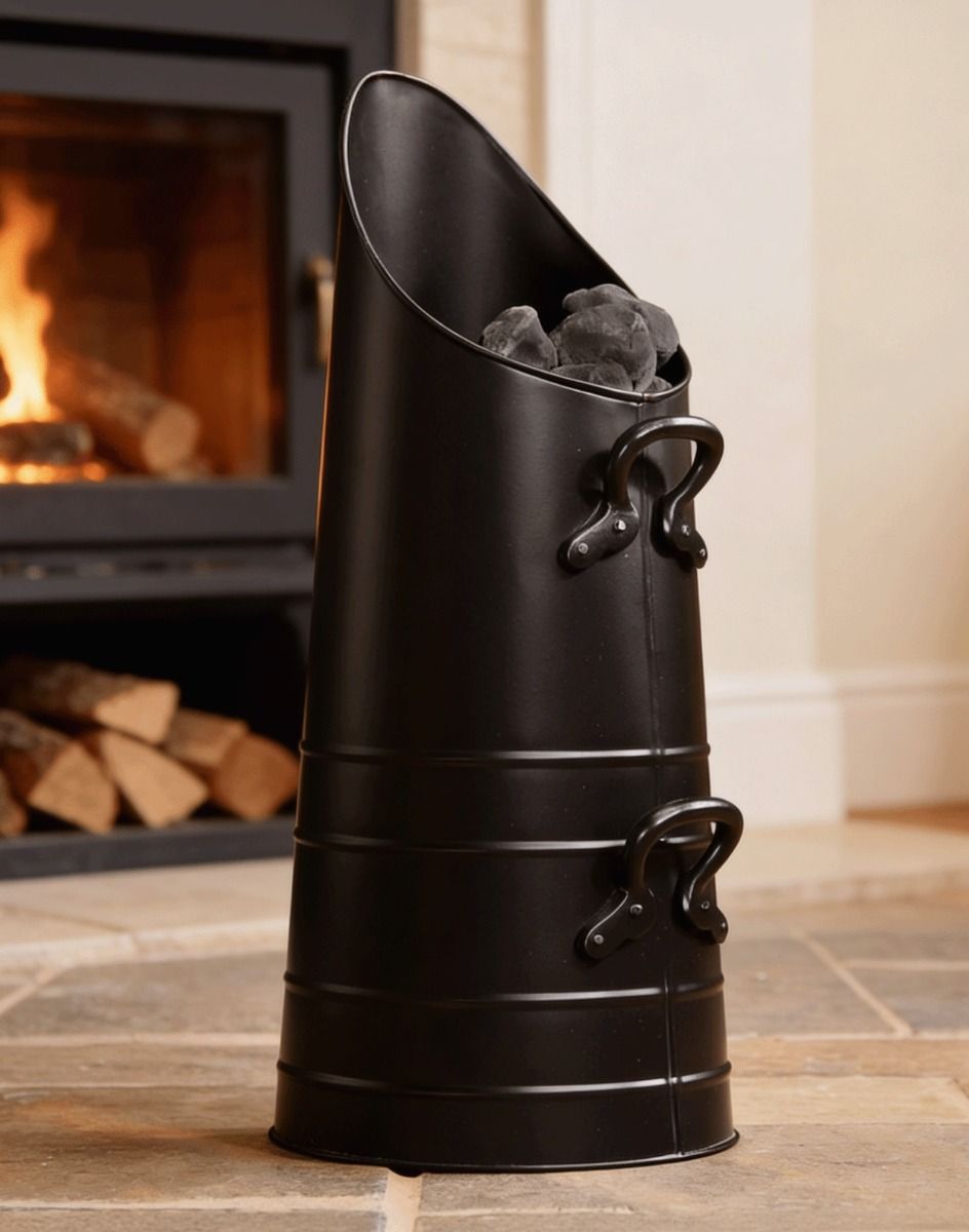 The Traditional "Norfolk" Coal Hod Positioned in Front of a Log Burner on a Stone Floor - Digital Illustration 