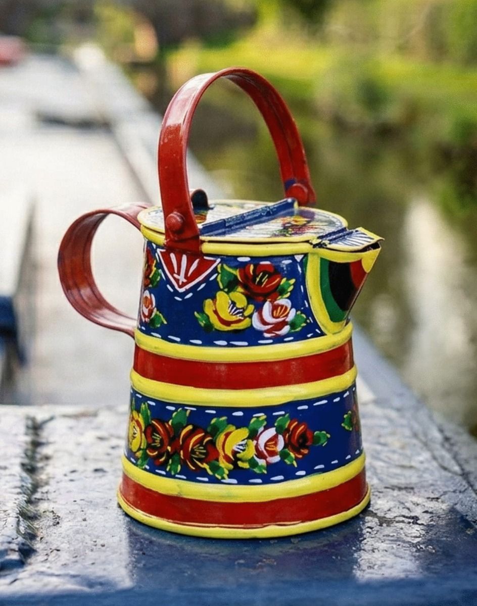 The Traditional Blue Hand Painted Watering Can Shown Displayed on a Blue Canal Boat Outside - Digital Illustration 