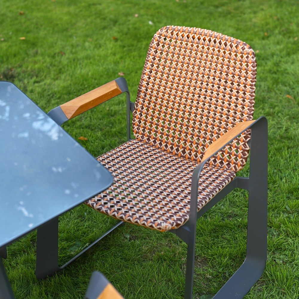 The Tribeca Weave 8-Piece Patio Dining Set Showing the Luxury Weave Chair