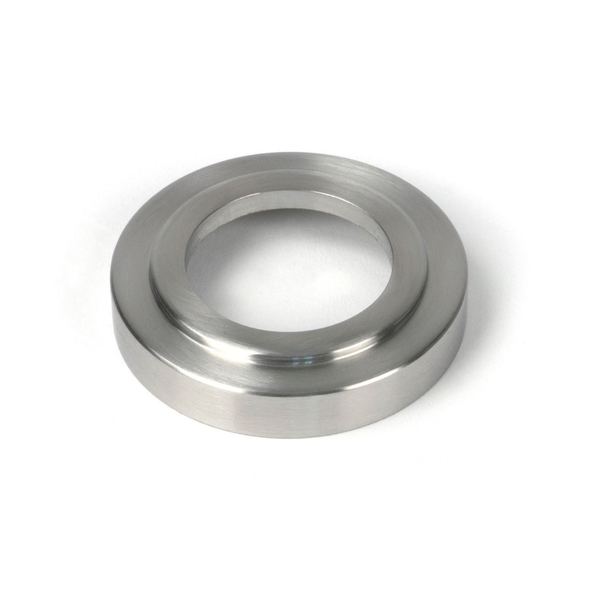 The Valen Tapered Sprung Handle Set on an Art Deco Rose in Satin Stainless Steel Showing the Rose Backplate