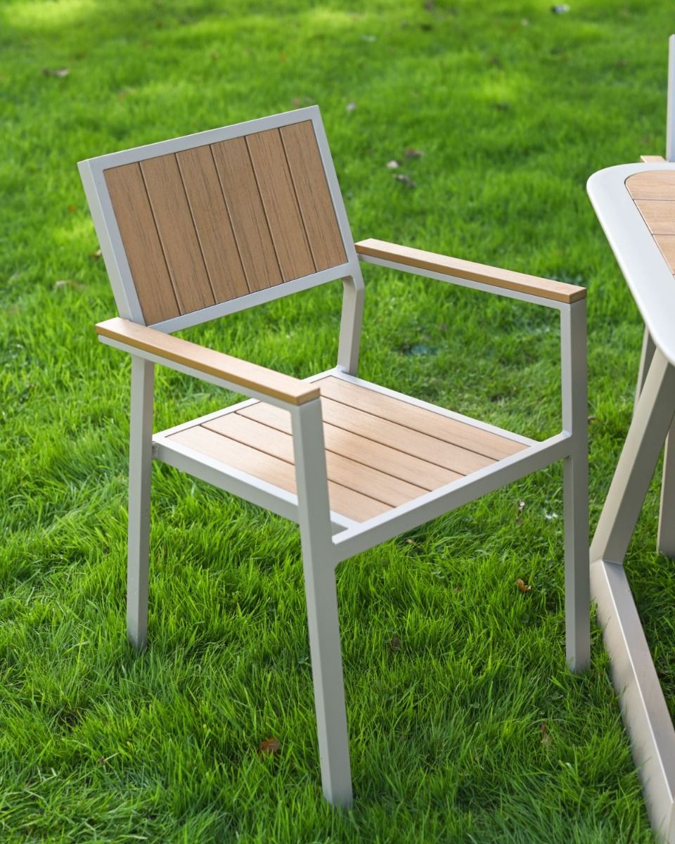 The Verve Quadrat 4 in Seater Outdoor Dining Set in Champagne Showing a Close of a Chair