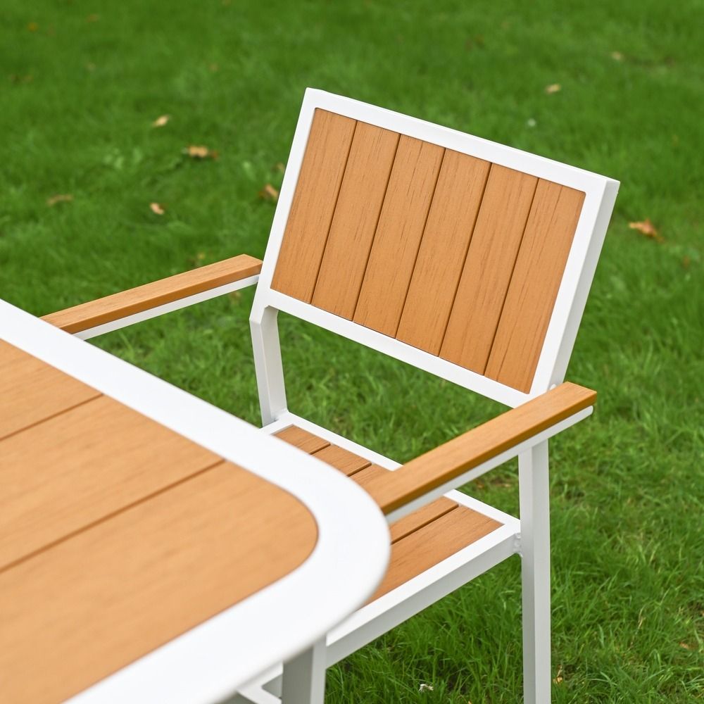 The Verve Quadrat 4 in Seater Outdoor Dining Set in White Showing the Angled Backrest of the Chairs