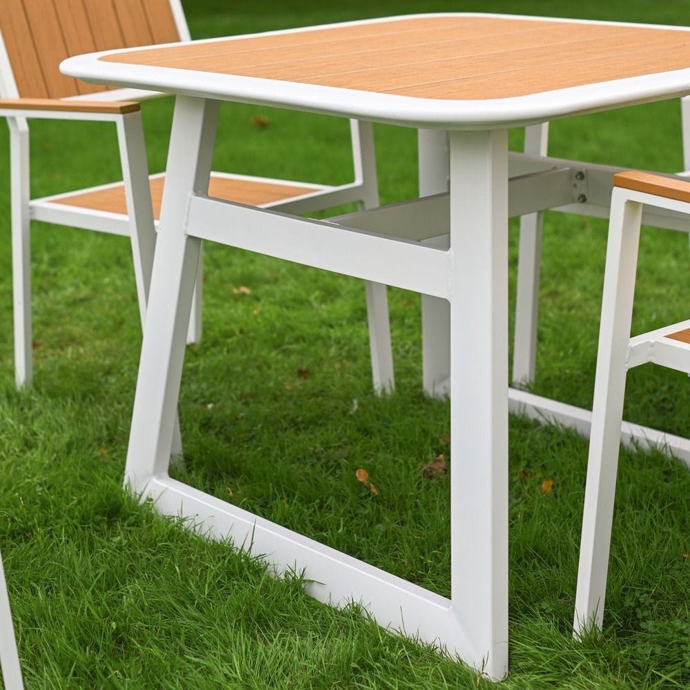 The Verve Quadrat 4 in Seater Outdoor Dining Set in White Showing the Angular Table Base
