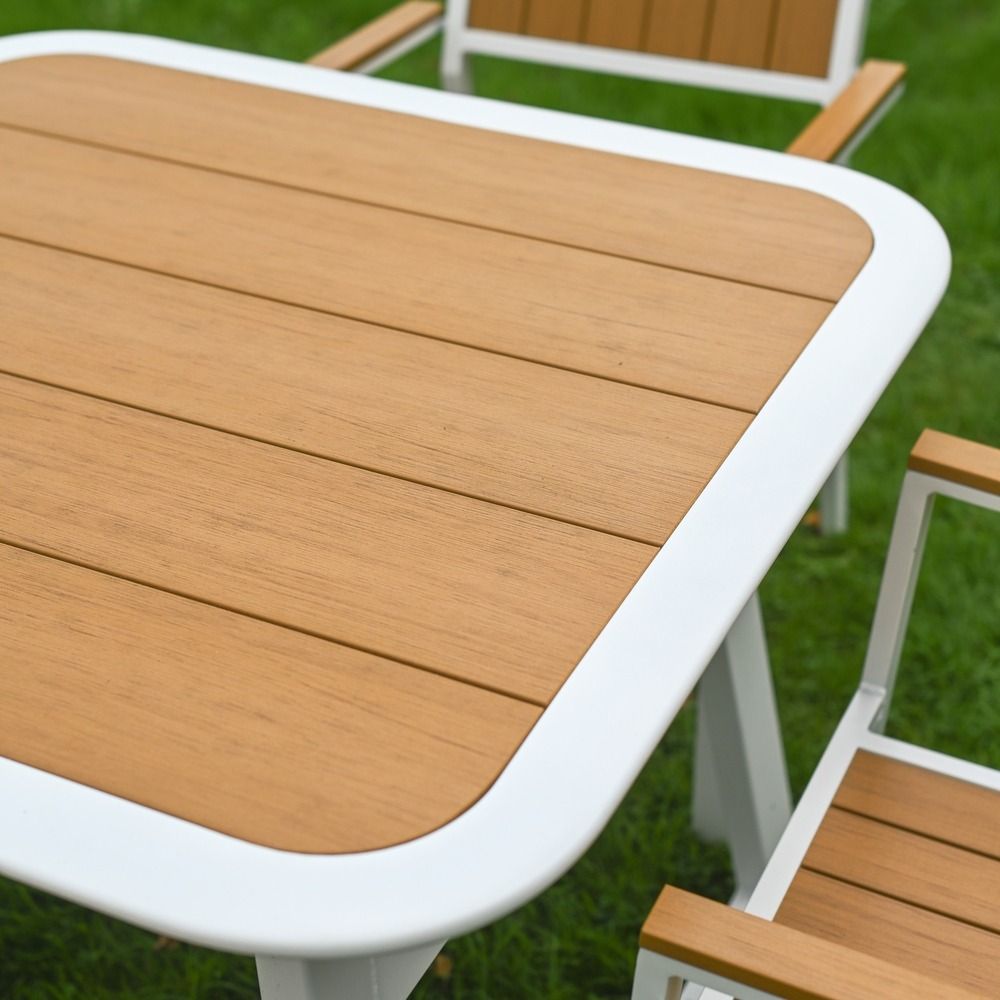 The Verve Quadrat 4 in Seater Outdoor Dining Set in White Showing the Wood Effect Table Top