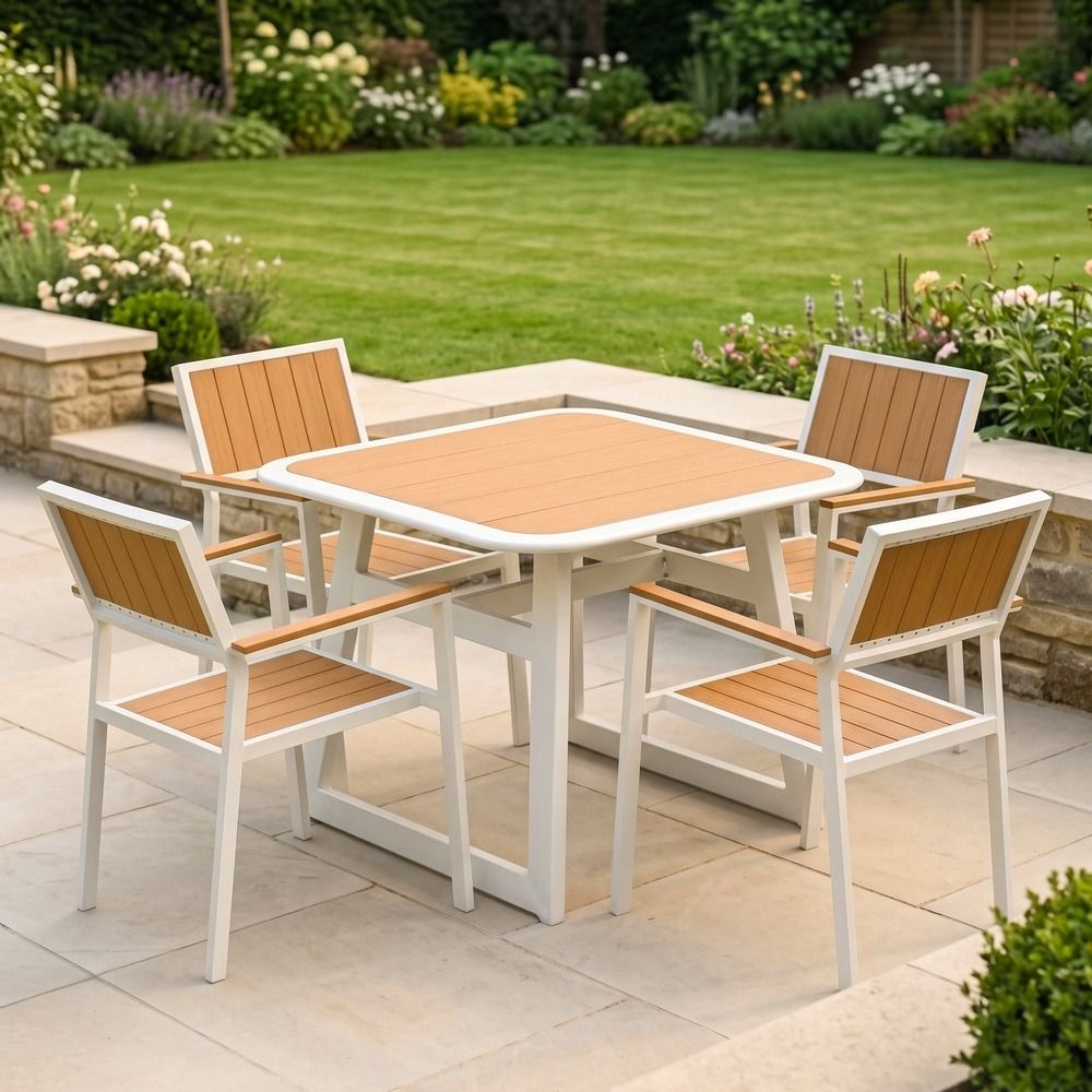 The Verve Quadrat 4 in Seater Outdoor Dining Set in White Shown in a Modern Garden Setting on a Patio