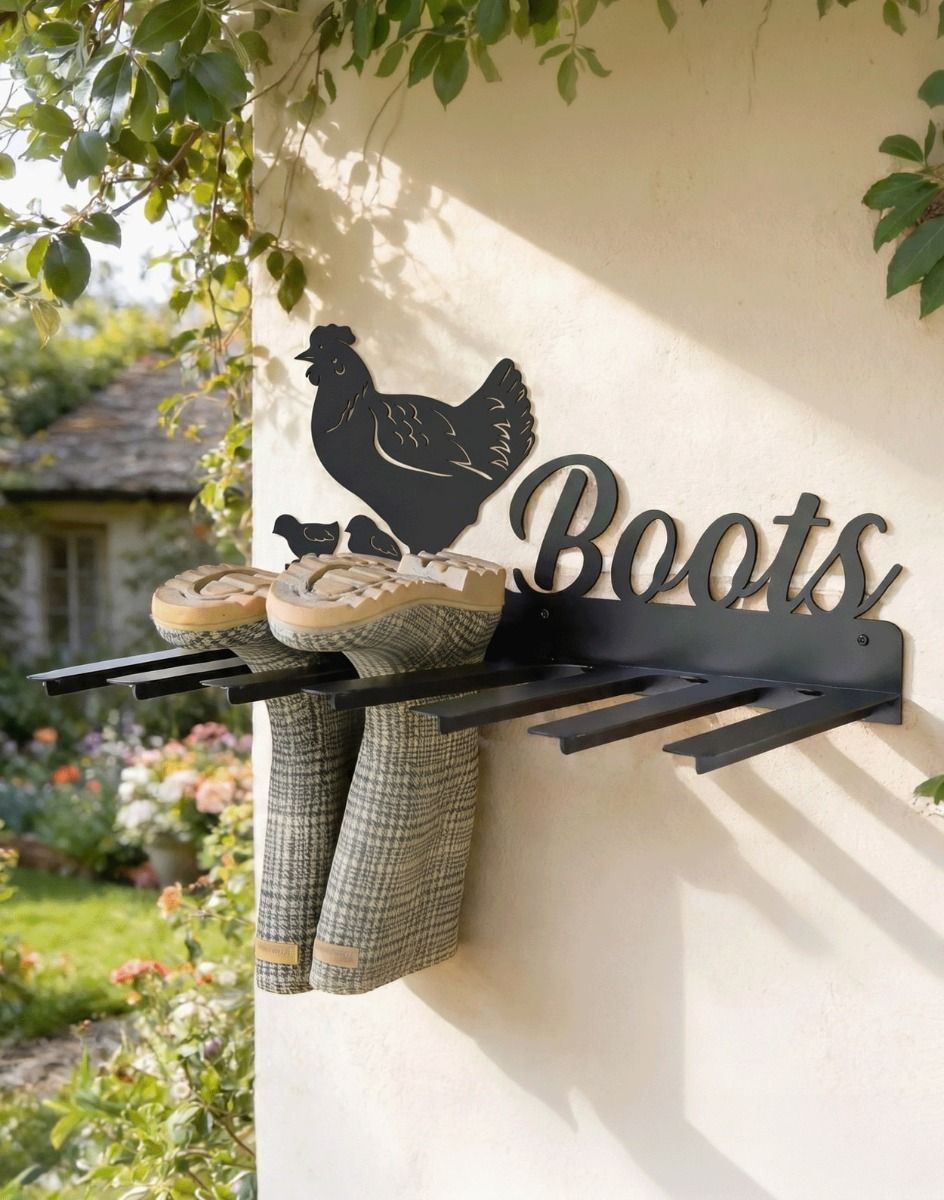 The Wall Mounted Hen & Chicks Iron Boot Holder Fixed to a Cream Cloured Exterior Wall - Digital Illustration 