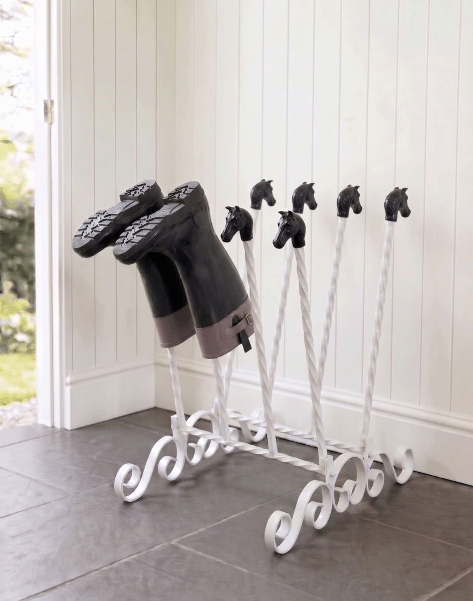 The White Catterick 4 Pair Boot and Welly Rack Mounted on a Stone Tiled Floor in a White Porch Entranceway - Digital Illustration