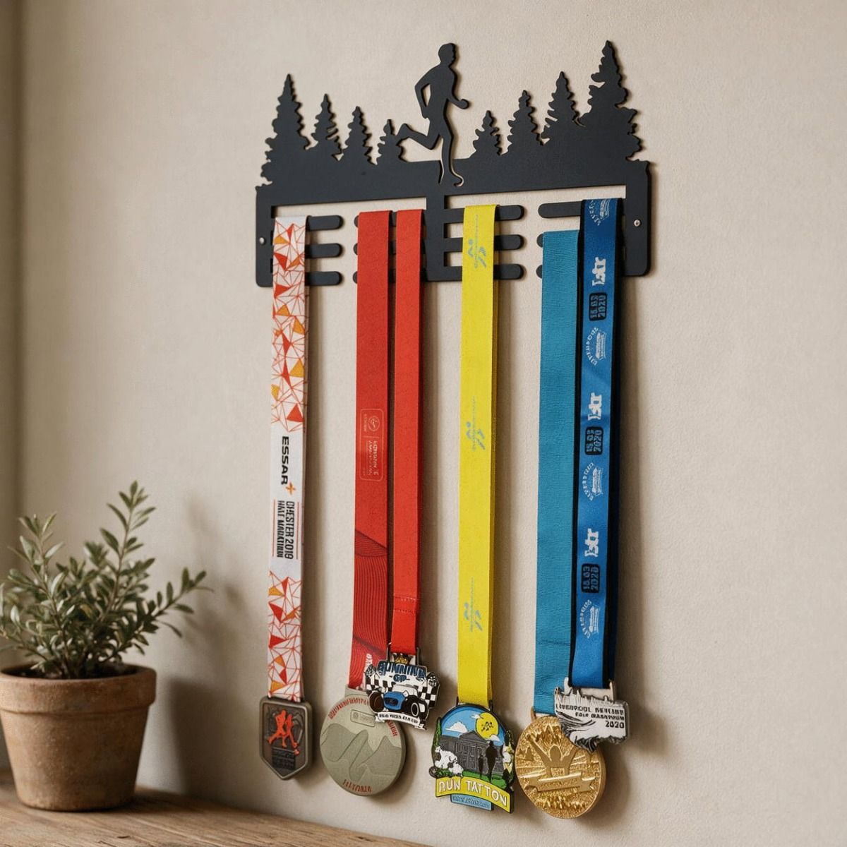 The Woodland Running Scene (Male) Sports Medal Hanger on a Sun Lit Magnolia Coloured Wall in a Country Home - Digital Illustration