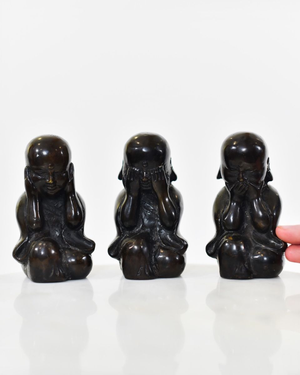 Three Graces of Zen in Cast Brass Set of Three with hand in shot for scale