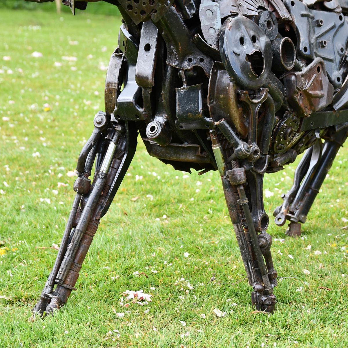Close-up of the Legs on the Tiger Recycled Metal Parts Sculpture Close-up of the Legs on the Tiger Recycled Metal Parts Sculpture