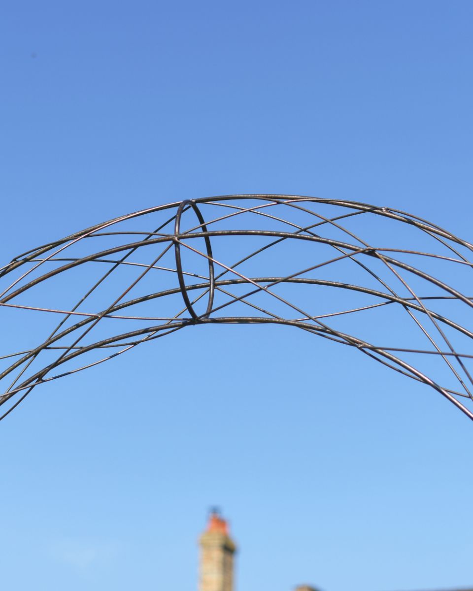 Close-up of the Rustic Laqcered Finish on the "Alauna" Rose Arch