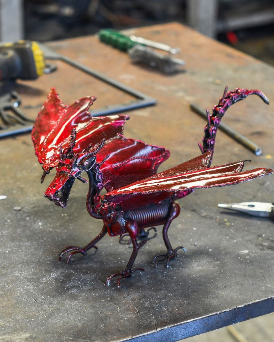 View of dragon wings on recycled metal sculpture